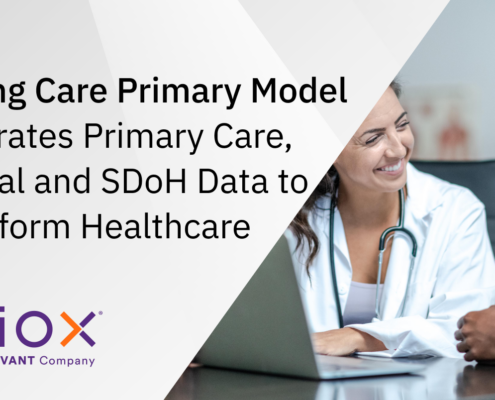 Making Care Primary Model Integrates Primary Care, Clinical and SDoH Data to Transform Healthcare. Image of a doctor with a laptop smiling at her patient.