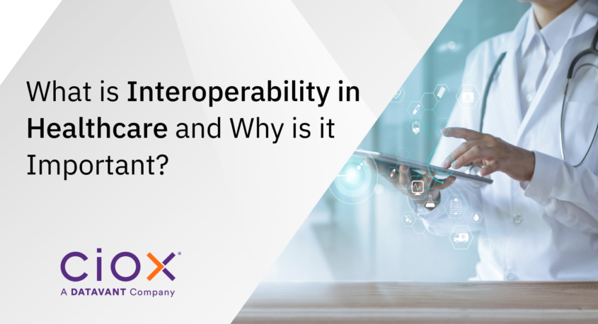What is Interoperability in Healthcare and Why is it Important? Image of a doctor accessing a touchscreen tablet.